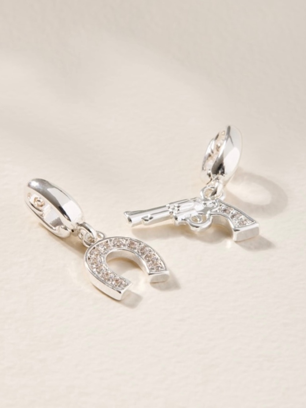 Francesca’s Collection Silver Horseshoe and Gun Charm Set NWT